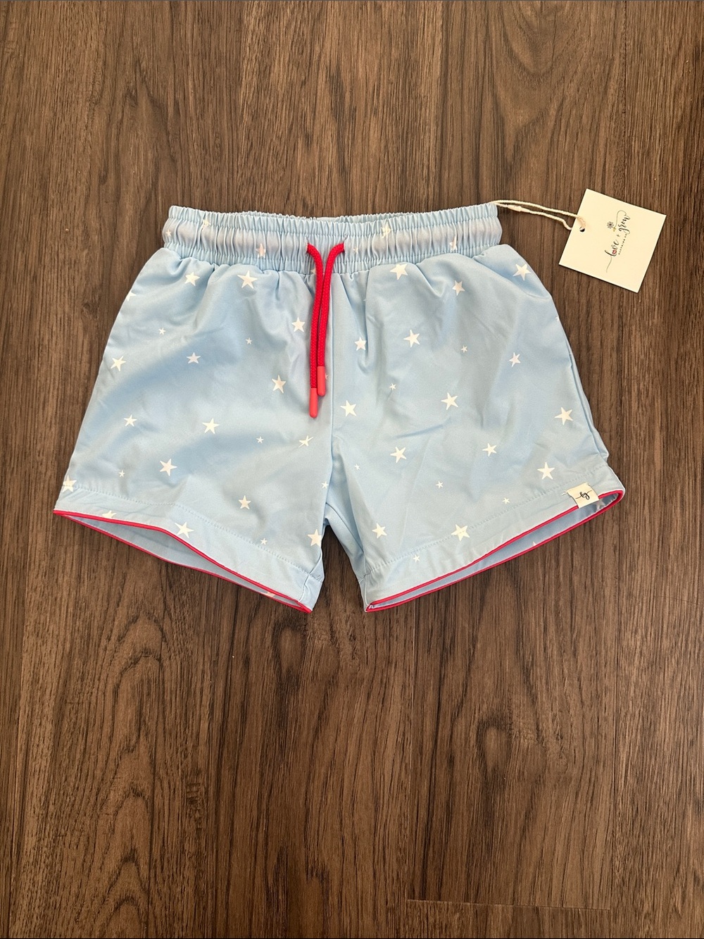 Light Blue Kids' Star Swim Trunks with Pink Trim